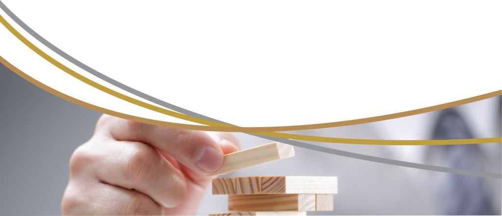 image of a person stacking blocks as a way of showing how Rempel Capital's proven models can act as the building blocks to a strong, stable investment portfolio